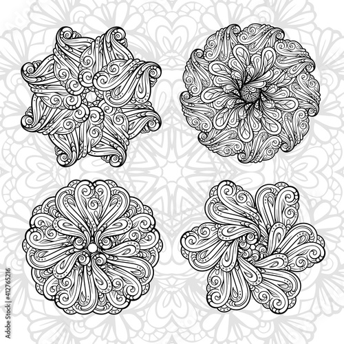 Black and white ethnic style floral mandalas set for antistress coloring. Abstract coloring page. photo