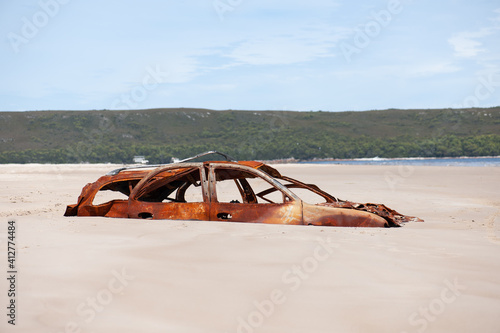 The Abandoned Car on the beach 