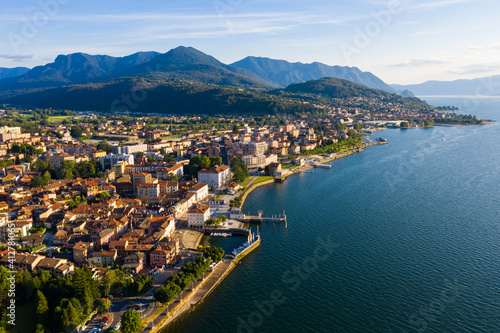 Canvas-taulu View from drone of summer Luino cityscape and Lake Maggiore, province of Varese,