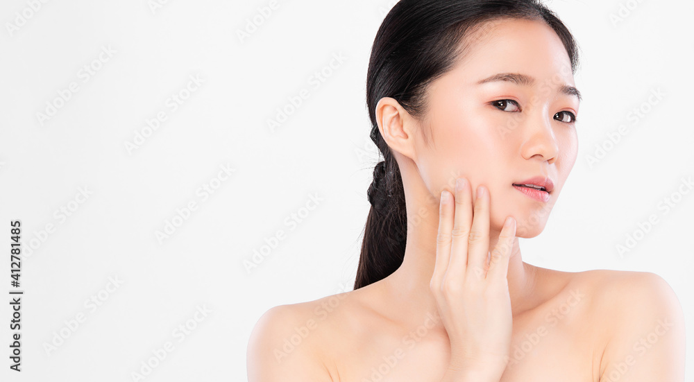 Beautiful young asian woman with clean fresh skin on white background, Face care, Facial treatment, Cosmetology, beauty and spa, Asian women portrait Beautiful young asian woman with clean fresh skin on white background, Face care, Facial treatment, Cosmetology, beauty and spa, Asian women portrait