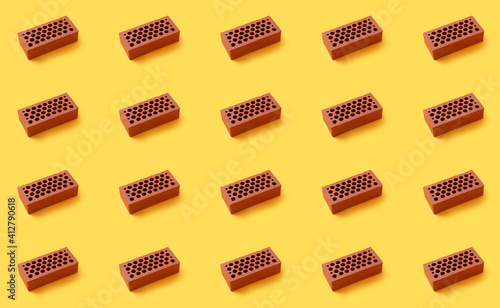Many red bricks on color ba...