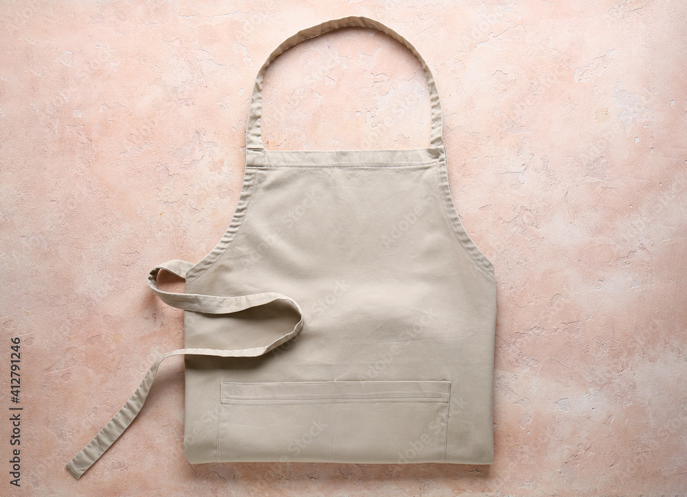 Foto Clean apron on color background