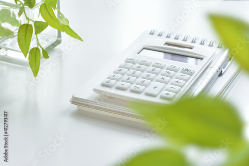  Calculator on a white desk