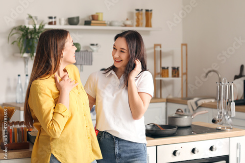 Happy young women laughing ...