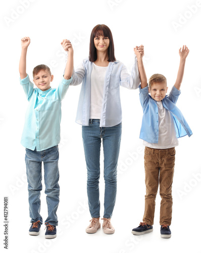 Happy mother and cute children on white background