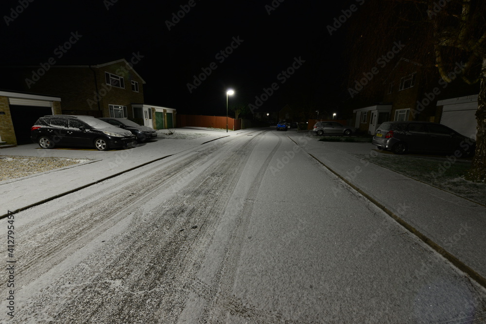 A frozen unsafe icy road in Horley in the UK in February 2021