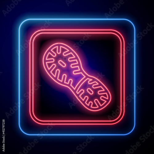 Glowing neon Human footprints shoes icon isolated on black background. Shoes sole. Vector.