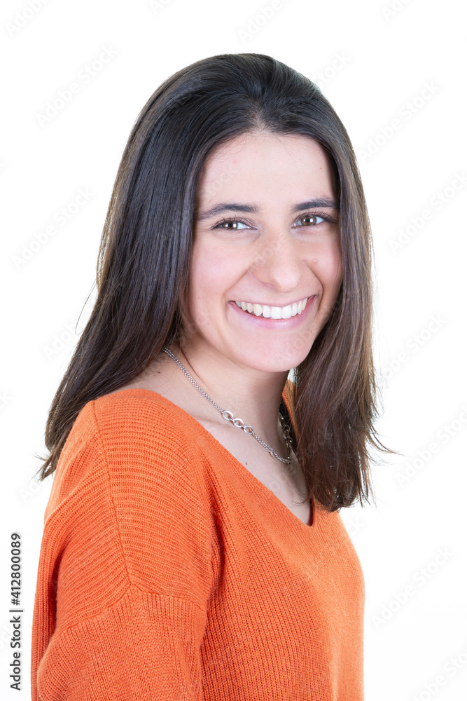 lovely woman with brunette hair face looks at camera wears orange sweater casual clothes poses in studio background lovely woman with brunette hair face looks at camera wears orange sweater casual clothes poses in studio background