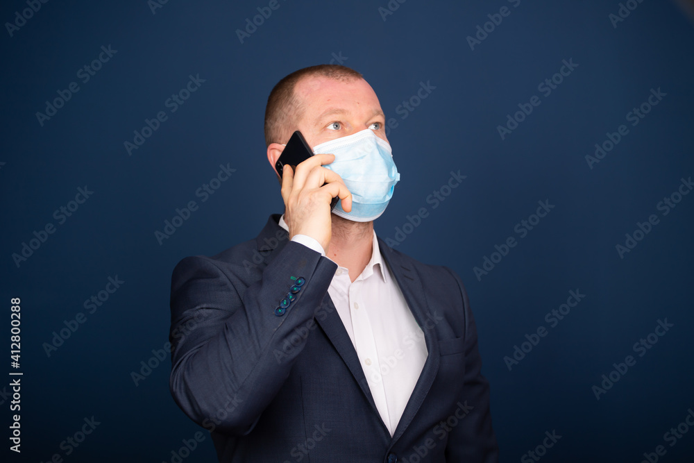 Business man talking on smartphone. Business man talking on smartphone.