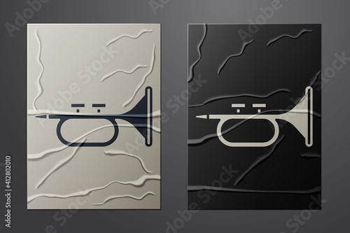 White Musical instrument trumpet icon isolated on crumpled paper background. Paper art style. Vector.