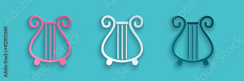 Paper cut Ancient Greek lyre icon isolated on blue background. Classical music instrument, orhestra string acoustic element. Paper art style. Vector.