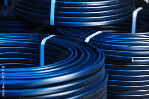 Set of black electric cable reels close up