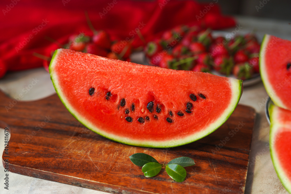 Red fresh watermelon on the wood