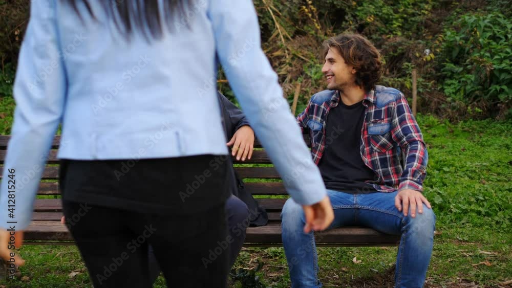 male complicity - girl reaches out to friends who exclude her from conversation male complicity - girl reaches out to friends who exclude her from conversation