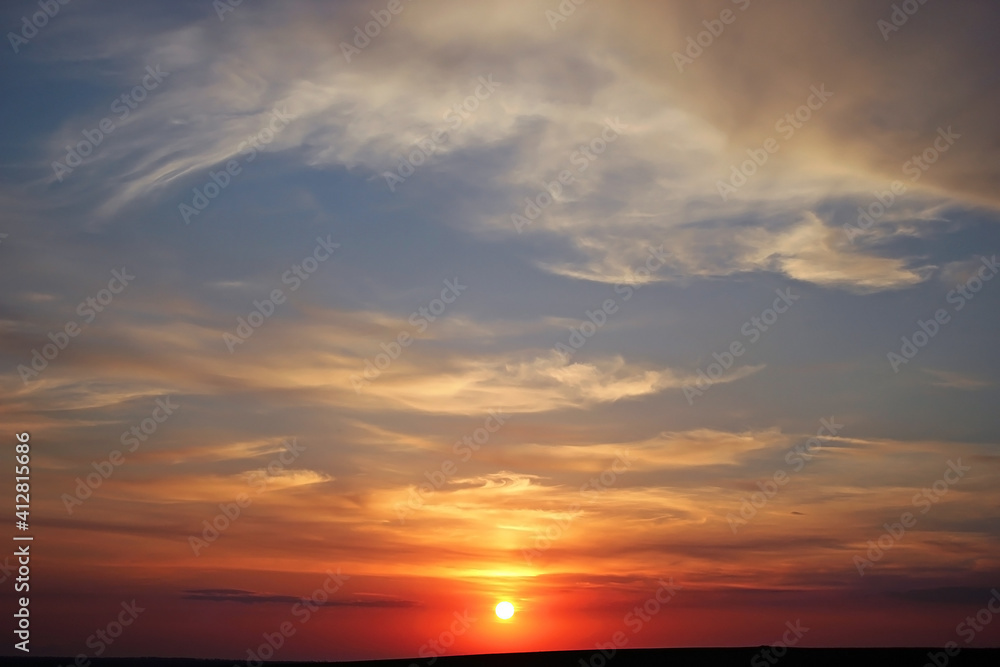 Beautiful sunset with clouds. Travel concept. Copy space for text.