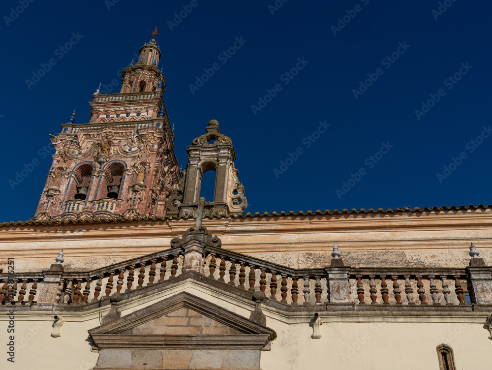 the San Bartolome Church under a deep blue sky
