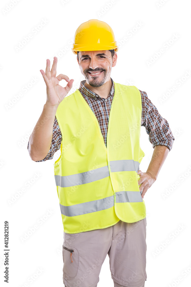 Content male contractor showing OK gesture Content male contractor showing OK gesture