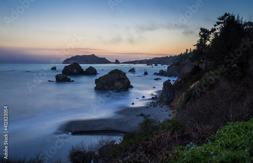 Long exposure shot of the Californian Pacific coast line in Trinidad Bay in twilight