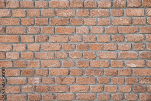 brown wall made of brick with rounded edges