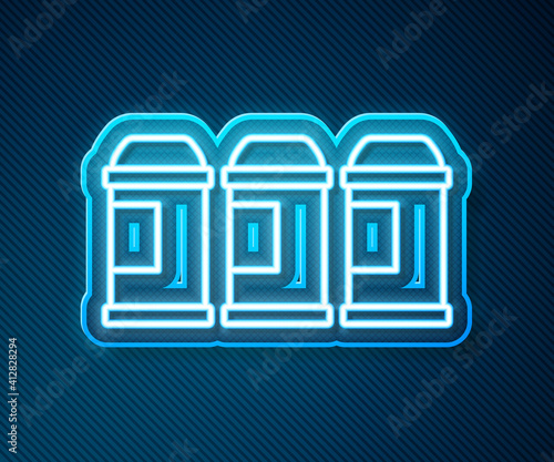 Glowing neon line Paint spray can icon isolated on blue background. Vector.