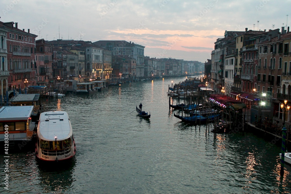 Cloudy sunset on Grand Canal Venice with a gondola