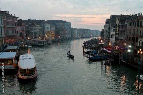 Cloudy sunset on Grand Canal Venice with a gondola