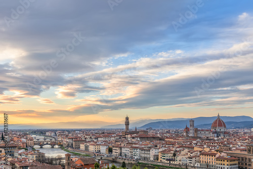 Beautiful sunset over Florence with landmarks. Palazzo Vecchio, Florence Cathedral, Ponte Vecchio. Tuscany, Italy