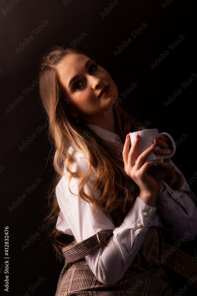 Portrait on a dark background of a young, beautiful woman with ore hair Portrait on a dark background of a young, beautiful woman with ore hair