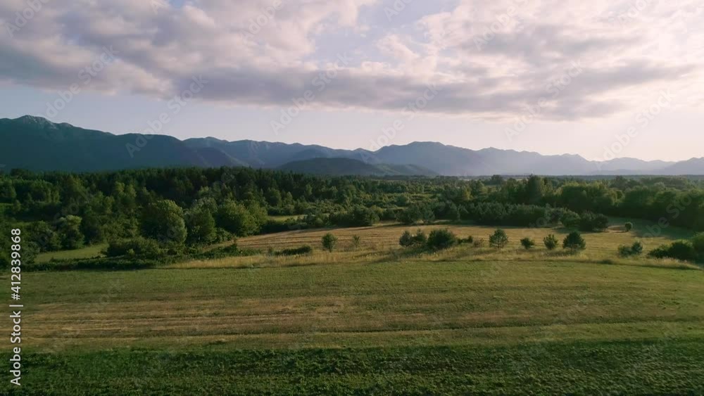 Aerial view of an agricultural field near Velebit mountain range, Croatia. Aerial view of an agricultural field near Velebit mountain range, Croatia.