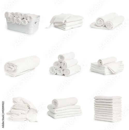 set of white spa Folded clean soft towels on white background