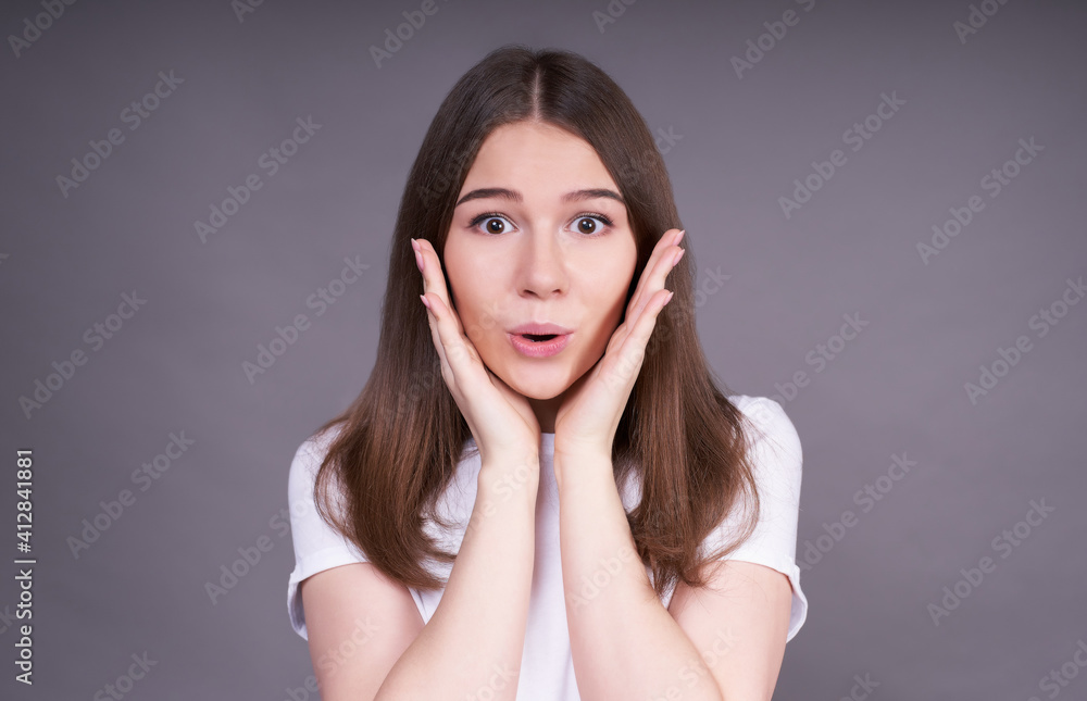 Portrait of an astonished young Caucasian girl. Portrait of an astonished young Caucasian girl.