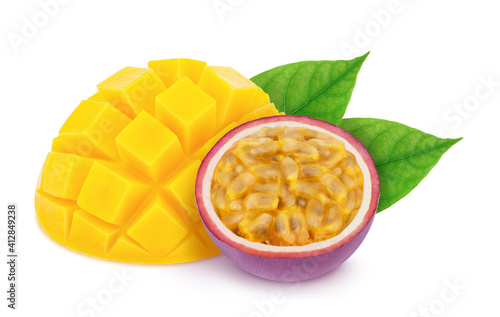 Colourful composition with cutted tropical fruits - passion fruit and mango isolated on a white with clipping path.