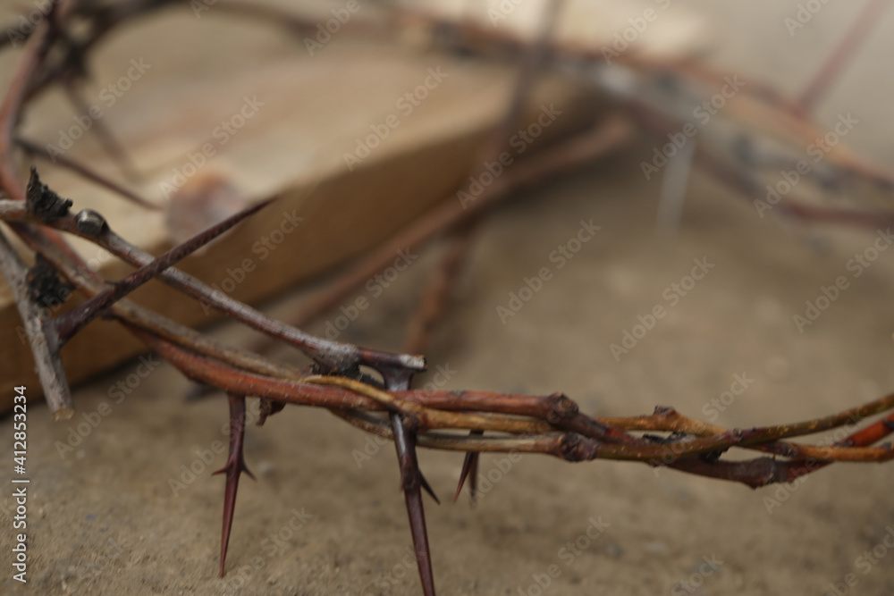Crown of thorns on ground, closeup. Easter attribute Crown of thorns on ground, closeup. Easter attribute