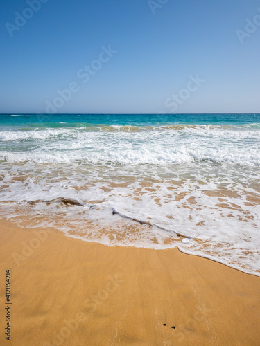 Wallpaper Mural Fuerteventura, Spain - Atlantic ocean coast at Canary Islands with beautiful turquoise water. Hot sunny beach day.  Torontodigital.ca