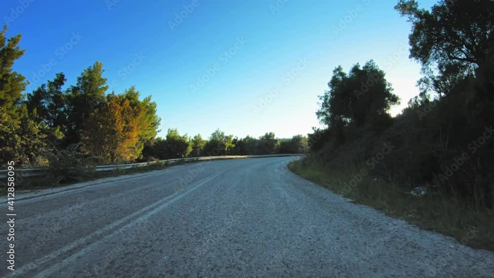 Countryside point of view car travel, clear blue sky, curvy tarmac road gopro POV vehicle drive Countryside point of view car travel, clear blue sky, curvy tarmac road gopro POV vehicle drive