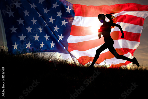 Young  woman silhouette  running over united states  waving flag