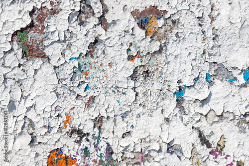 Old white dirty spotty concrete wall.