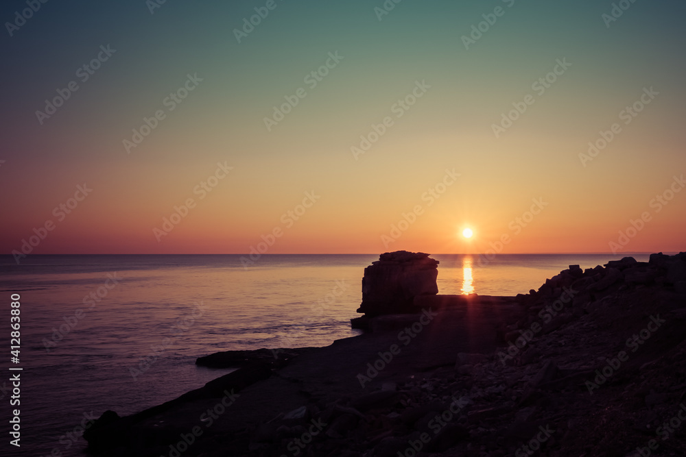 Pulpits Rock, Portland Bill At Sunset On The Jurassic Coast In Dorset, England