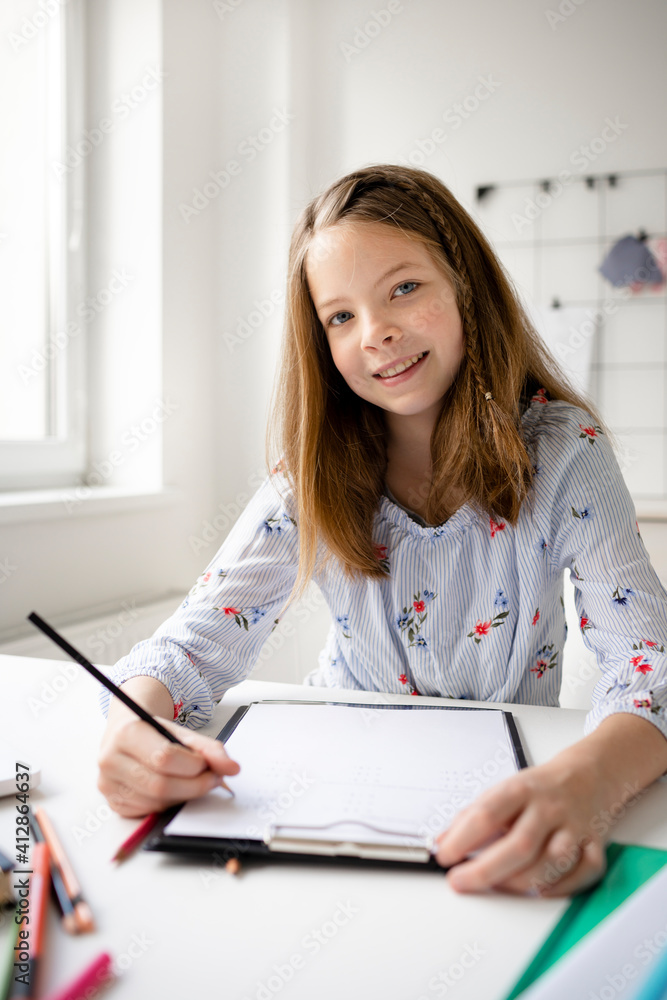 girl school pupil distance learning doining school homework, watching webinar, zoom meeting lesson on laptop at home, in classroom. girl school pupil distance learning doining school homework, watching webinar, zoom meeting lesson on laptop at home, in classroom.