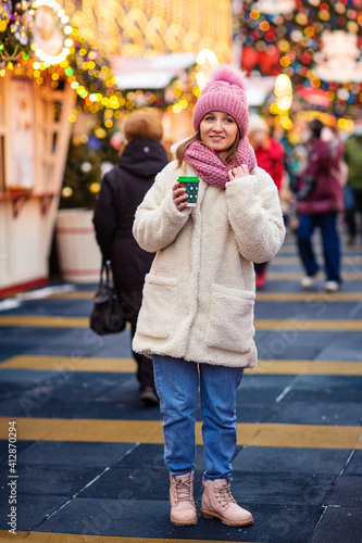girl walks around the festive city