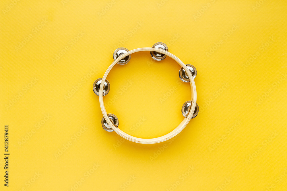 Musical instrument tambourine, top view. Music abstract background Musical instrument tambourine, top view. Music abstract background