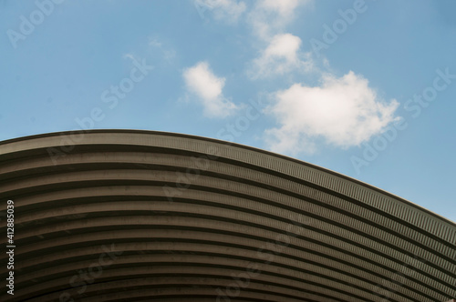 Beautiful curved roof against the sky background