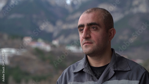 Portrait of male worker of Caucasian nationality close-up.