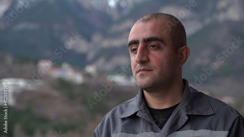 Portrait of male worker of Caucasian nationality close-up.
