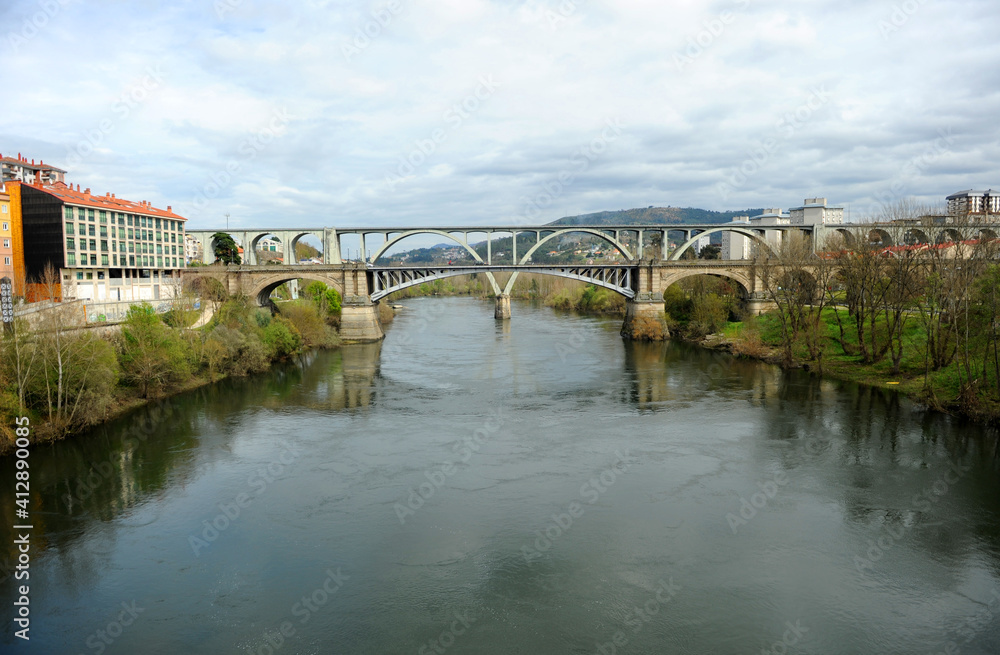 Ourense Orense New Bridge Ponte Nova and railway viaduct over the river Miño, Galicia, Spain 