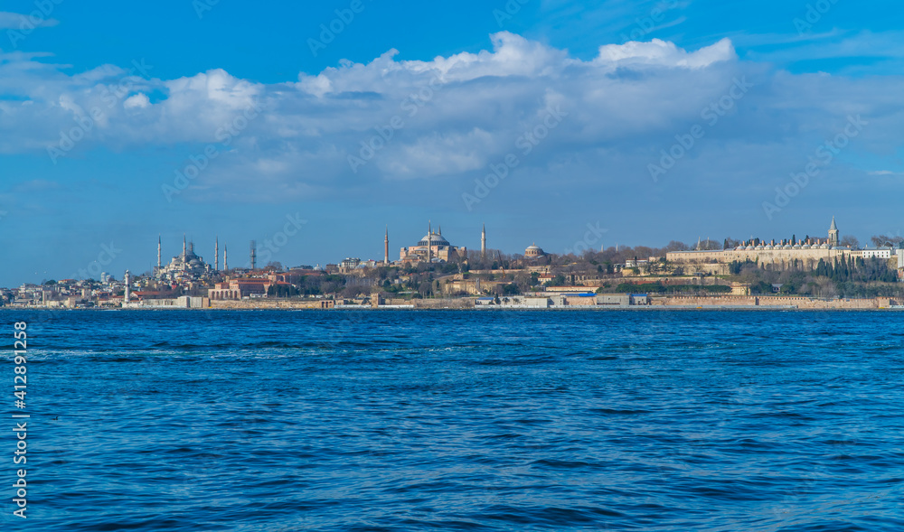 Panoramic view of the Hagia Sophia Grand Mosque, Sultanahmet (Blue Mosque) Mosque and Topkapi Palace in Istanbul, Turkey seen from the Bosporus