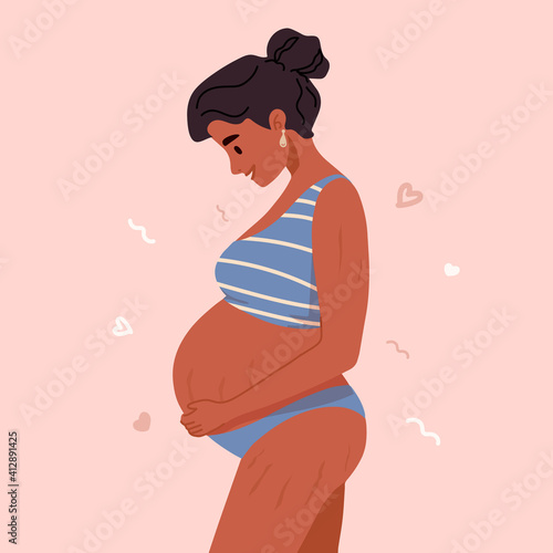 Beautiful smiling pregnant woman in underwear or swimsuit. Pregnancy belly, stretch marks. Self love, body positive Motherhood. New born. Preparation for childbirth. Mother's Day