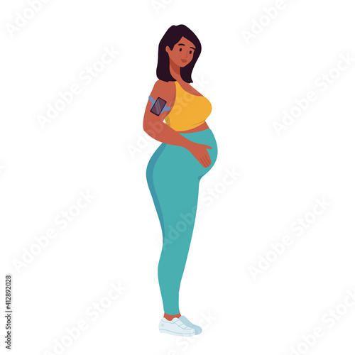 Young pregnant woman in sportswear doing yoga at home. Prenatal sport exercise, aerobic activity. Trendy scandinavian hygge interior, living room. Happy motherhood healthy lifestyle