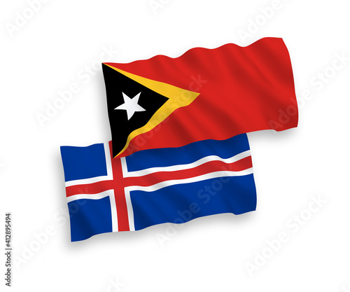 Flags of East Timor and Iceland on a white background