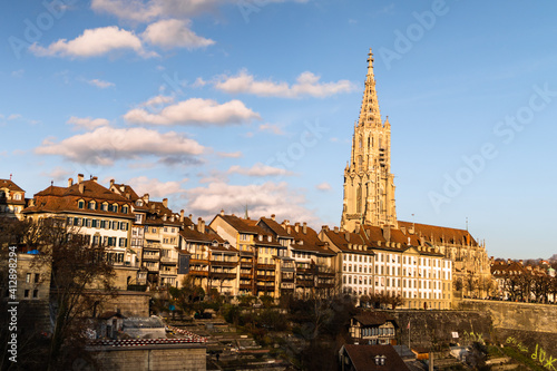 Wallpaper Mural Bern Minster with the sun and the roofs of the old city Torontodigital.ca